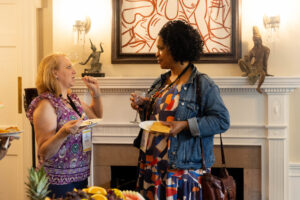 Alums talk during a Reunion event at Randolph House
