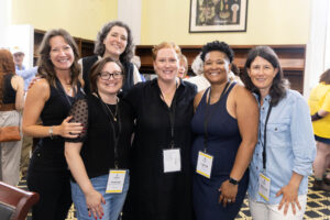 A group of women standing together at Reunion