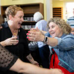 Two alums reunite and hug during Reunion