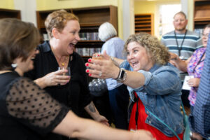 Two alums reunite and hug during Reunion