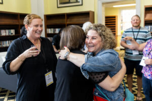 Two alums reunite and hug during Reunion
