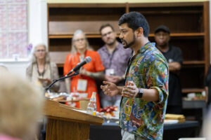 A speaker talks to alums in Lipscomb Library during a Reunion event