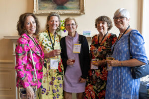 A group of alums pose for a photo together during Reunion