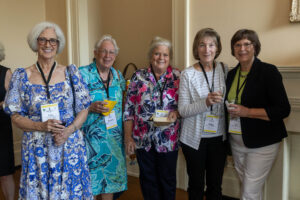 A group of alums pose for a photo together during Reunion