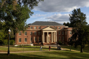 A distant shot of a brick building 