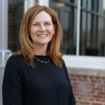 Victoria Turgeon ’93 poses for a portrait on the Student Center deck