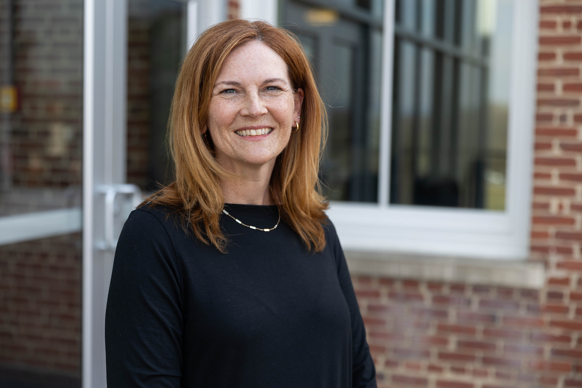 Victoria Turgeon ’93 poses for a portrait on the Student Center deck
