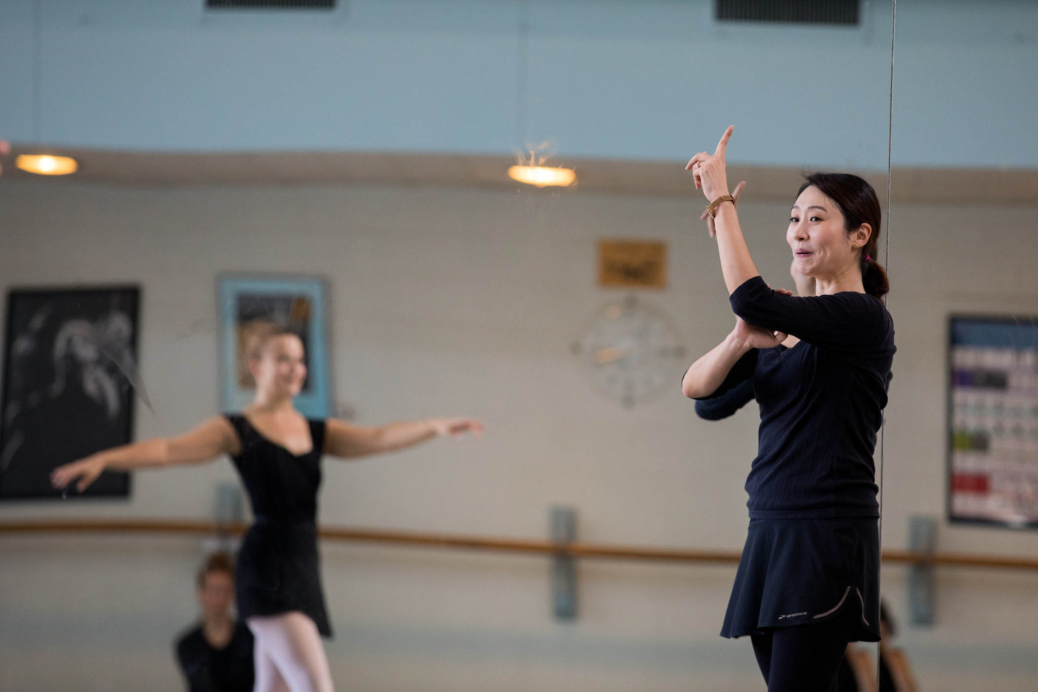 Visiting artist Eun Kyung Chung gives notes in dance class