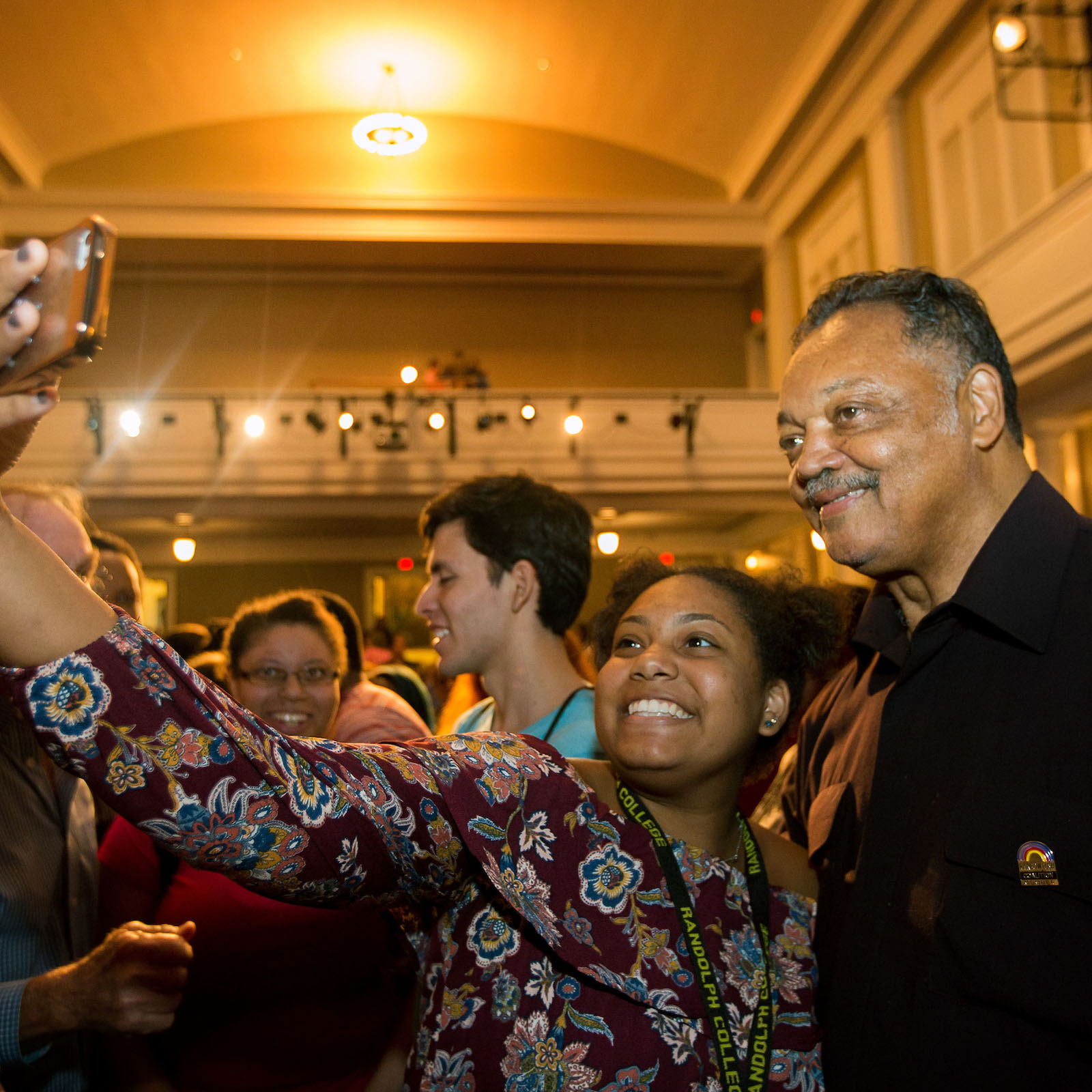 Young Randolph College student takes a selfie with civil rights leader Rev. Jesse Jackson