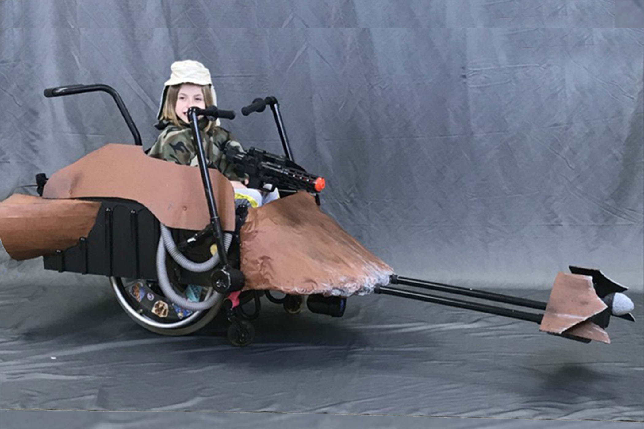 This young Princess Leia was thrilled with her Endor speeder bike wheelchair Halloween costume custom-built by Randolph College SPS.