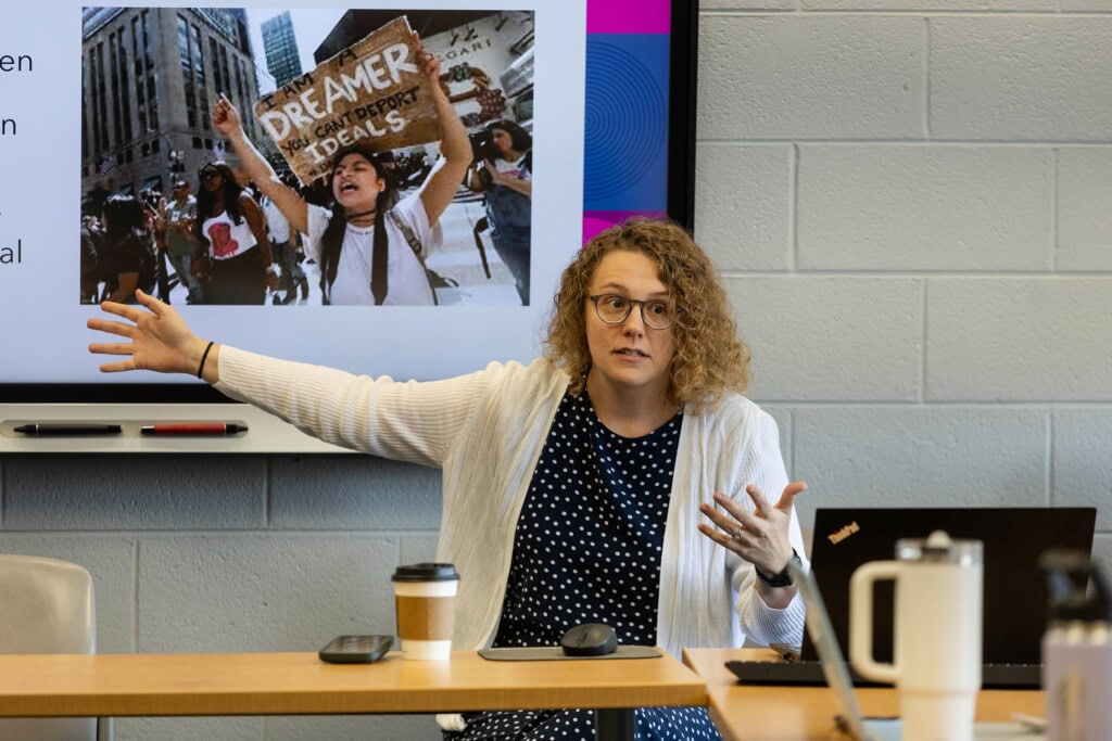 Professor Crystal Peoples discusses experiential learning opportunities with students.