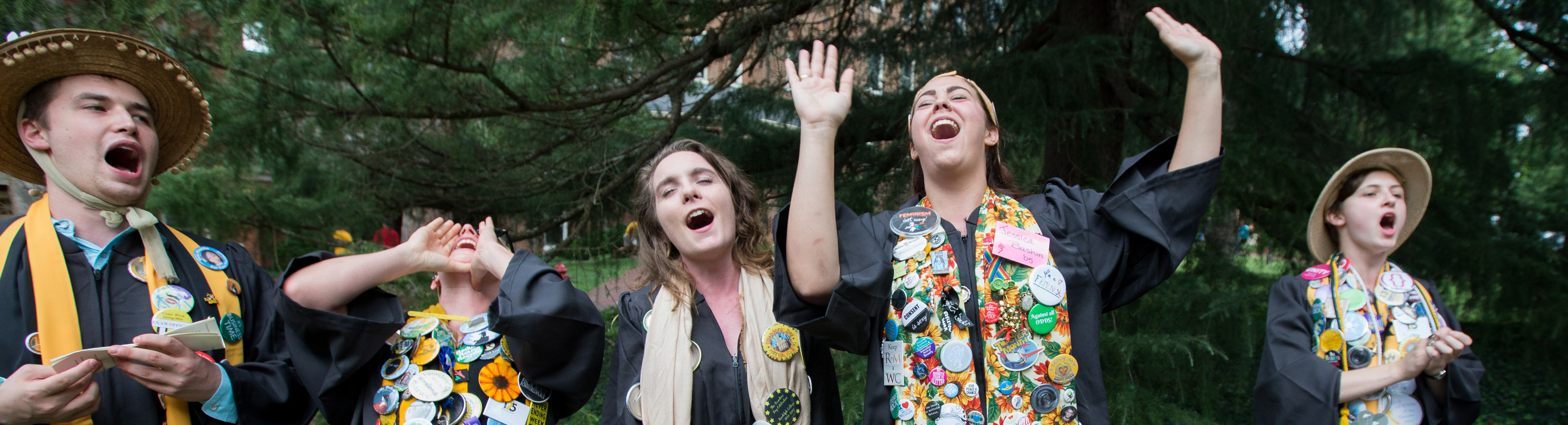 Students at a yearly event wearing buttons.