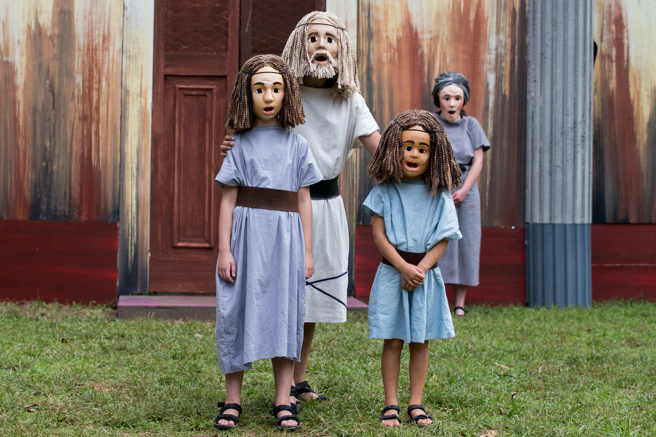 Costumes and masks adhere to original conventions of the time.