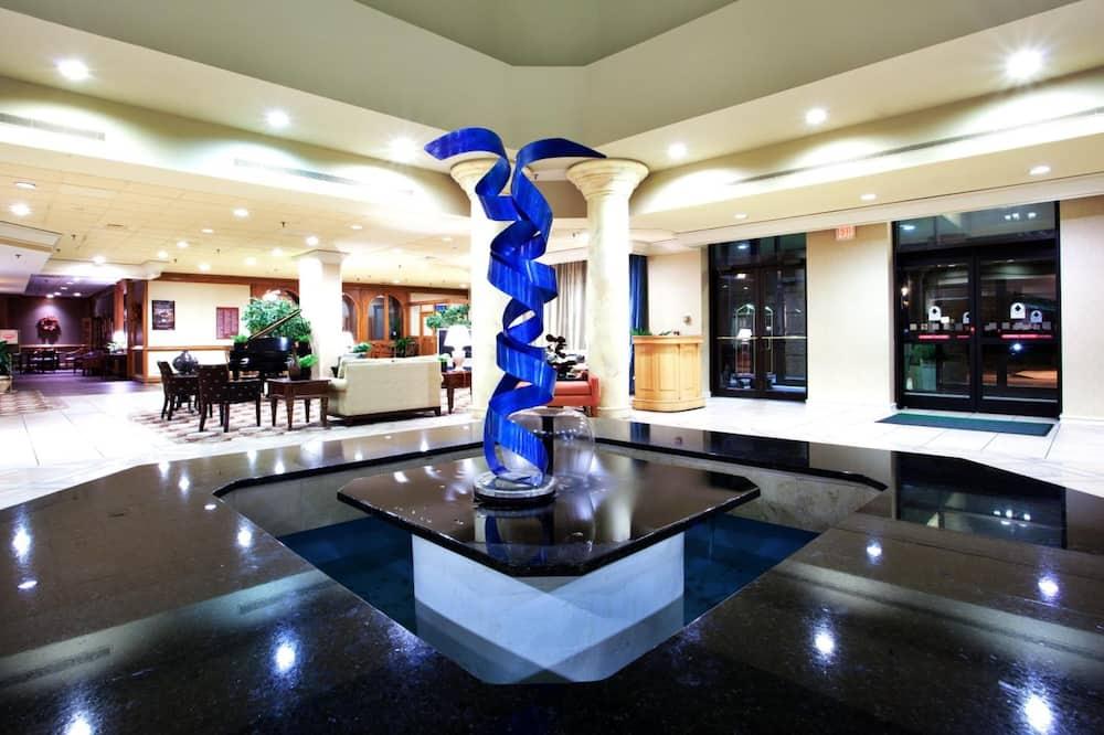 Blue glass art sculpture in the lobby of the Lynchburg Grand Hotel.